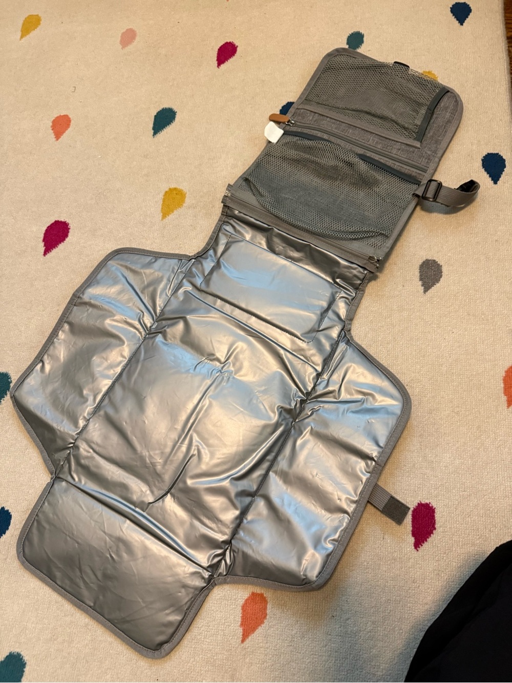 portable diaper changing station in gray.